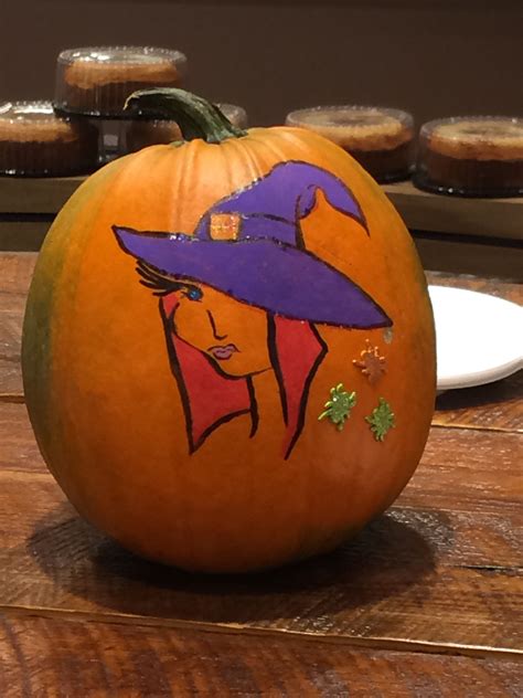 Witch hat adorned pumpkin
